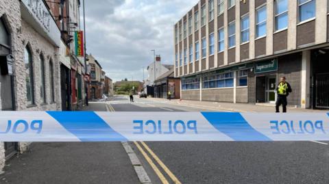 A police cordon in Derby city centre after two men were stabbed. 