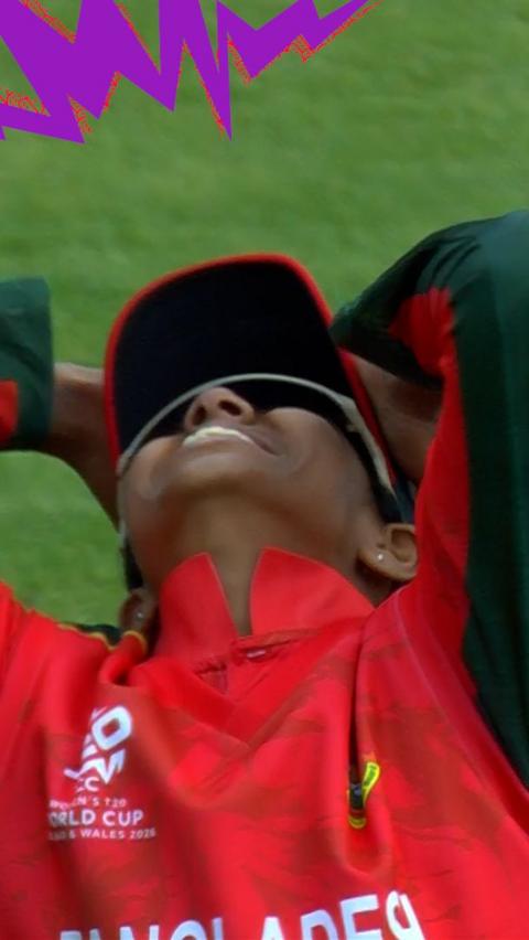 Bangladesh fielder reacts after her overthrow goes for four