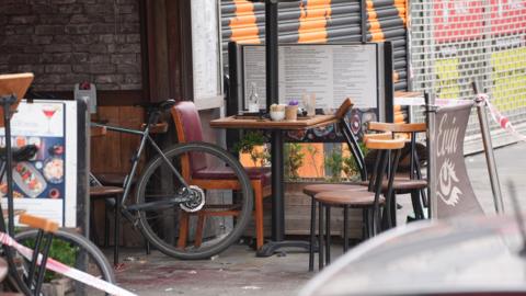 the restaurant tables and chairs in the immediate aftermath 