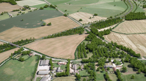 An aerial view of green field in Hereford where part of the route would go.