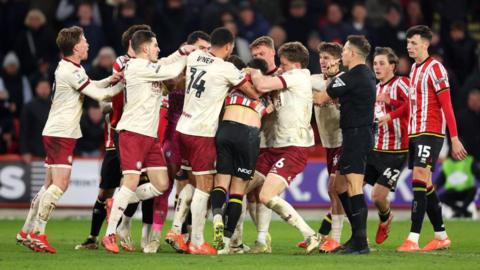 Players from Sheffield United and Bristol City involved in a confrontation 