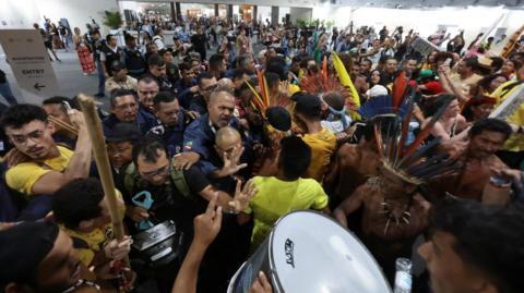Protesters try to enter the COP30 venue in Brazil.
