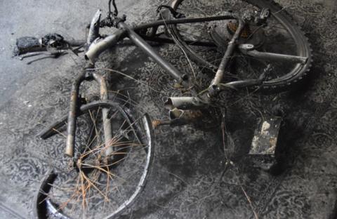 An e-bike damaged from a ion-lithium battery explosion.