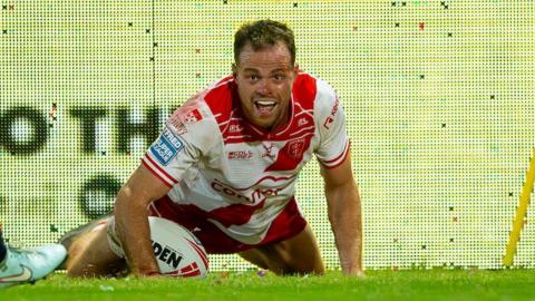 Joe Burgess celebrates a try against St Helens