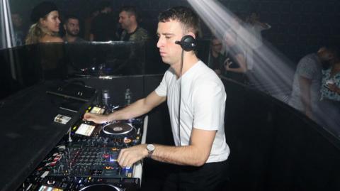 Jackmaster spins during Prada Double Club Miami, A Carsten Holler Project at Ice Palace Film Studios on December 6, 2017 in Miami, Florida. 