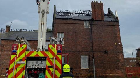 Firefighters tackling the fire