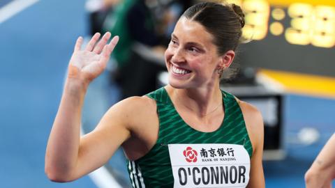 Kate O'Connor waves to Irish supporters in Nanjing