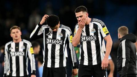 Newcastle players look dejected