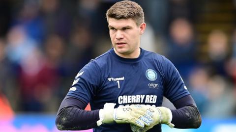 Wycombe goalkeeper Max Stryjek 