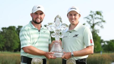 Alex and Matt Fitzpatrick pose with the trophy after winning the Zurich Classic on the PGA Tour in April 2026