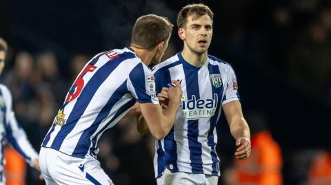 Jayson Molumby is congratulated by his West Bromwich Albion team-mate Krystian Bielik after scoring the winning goal against Swansea City