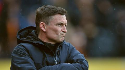 Paul Heckingbottom stood with his arms folded during Preston's loss at Hull
