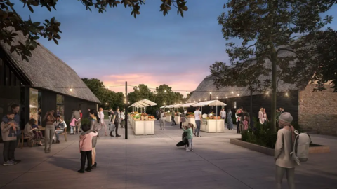 A CGI picture of community buildings with two rows of stalls in the middle of two of the buildings, which look like renovated barns, at dusk. People are sitting outside the buildings, looking at the stalls and walking by