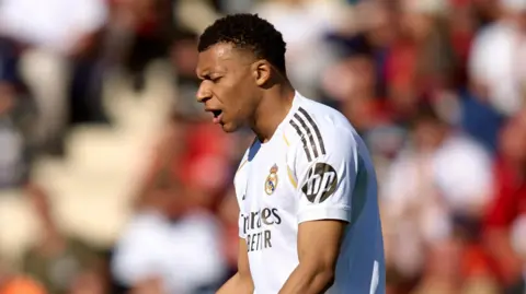 Kylian Mbappe appears dejected in Real Madrid's defeat