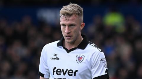 Ross McCrorie standing on the pitch during a game for Bristol City this season