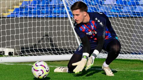 Louie Moulden pictured while warming up for a game for Crystal Palace U21s