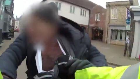 Man being arrested in Saffron Walden town centre