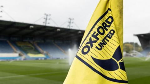 Oxford United crest on a corner flag at the Kassam Stadium