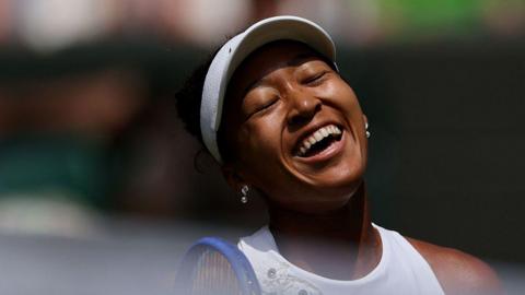 Naomi Osaka smiles after her victory over Daria Kasatkina