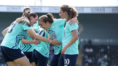 London City players celebrate scoring against Leicester City in the WSL