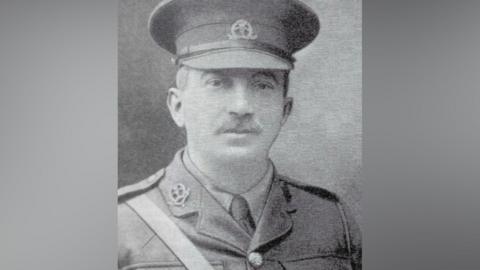 A black and white photo of a British military officer.