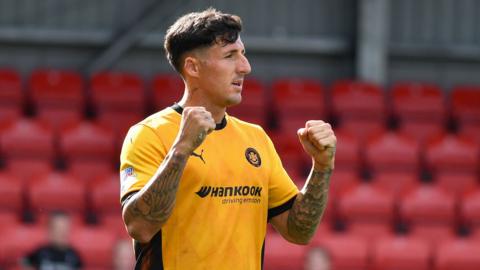 Danny Gibson celebrates