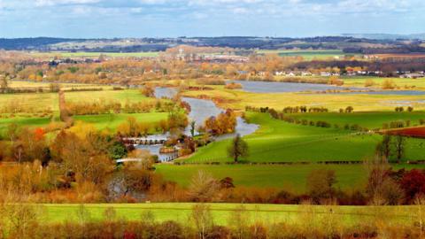 A view of stereotypical English countryside with a Lock on the River Thames at Little Wittenham.