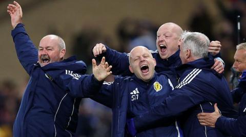 Steve Clarke and backroom staff celebrate