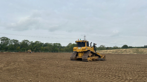 The area where the new cricket pitch will be