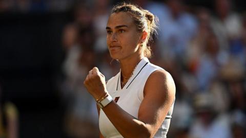 Aryna Sabalenka celebrates victory over Jelena Ostapenko