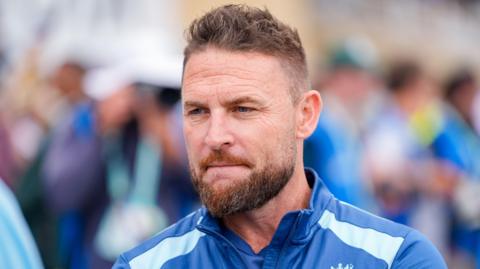 England head coach Brendon McCullum looks on