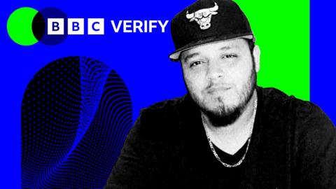 Kilmar Abrego Garcia looks at the camera. He is wearing a Chicago Bulls hat and a chain. He is imposed over the BBC Verify colours. 