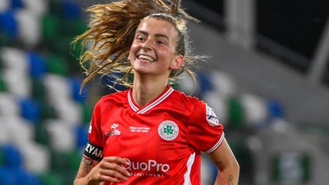 Caitlin McGuinness celebrates