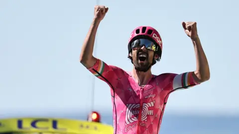 Ben Healy celebrates after winning stage six of the 2025 Tour de France