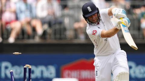 England's Joe Root is bowled in the first Ashes Test