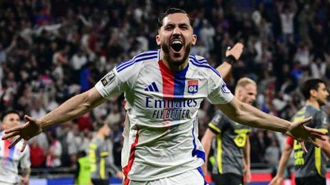Rayan Cherki celebrates after scoring for Lyon against Lille