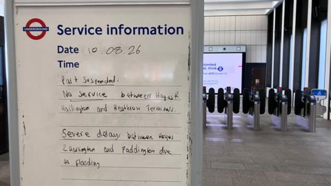 Part suspended service information board at station 