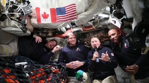 Astronauts in the Artemis II spacecraft