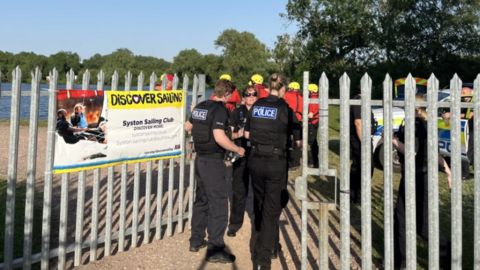 Police officers at the lake