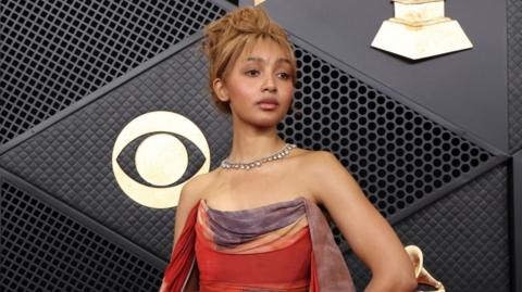 PinkPantheress poses at the red carpet during the premier