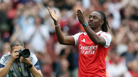 Eberechi Eze applauding the supporters at Emirates Stadium