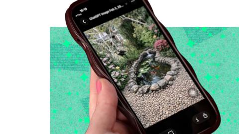 Hand holding a mobile phone with an AI image of a garden pond