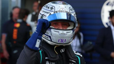 Kimi Antonelli clenches his fist in celebration after taking pole for position for the Monaco Grand Prix