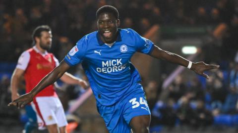 David Kamara celebrates scoring