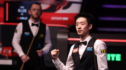 Wu Yize celebrates
