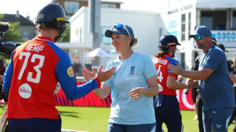 England head coach Charlotte Edwards celebrates with Freya Kemp after their T20 series victory against New Zealand