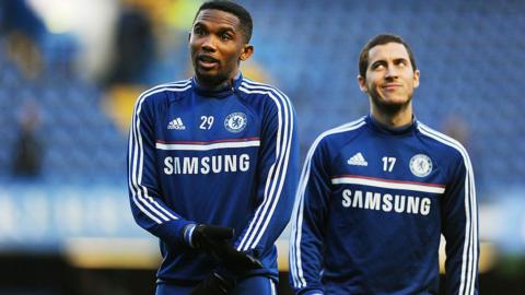 Chelsea players Samuel Eto'o and Eden Hazard warm up