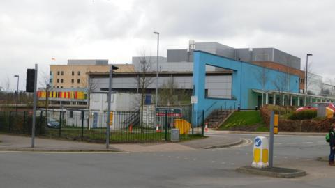 The exterior of the Royal Stoke University Hospital viewed from the road.