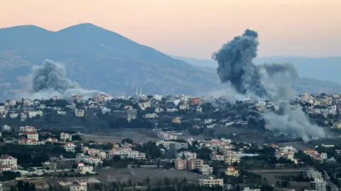 Smoke plumes rise over Khiam in southern Lebanon