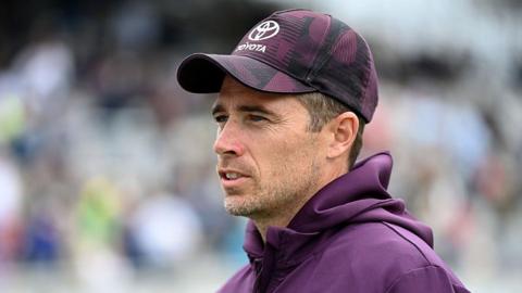 Tim Southee looking on
